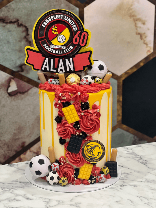 A football-themed celebration cake reading Alan 60th.
